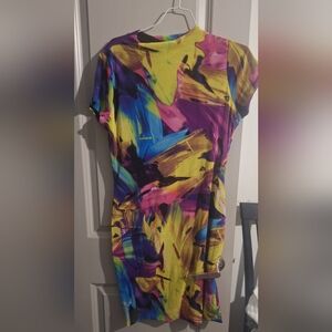 Beautiful vivid color dress with built-in slip. Never worn.